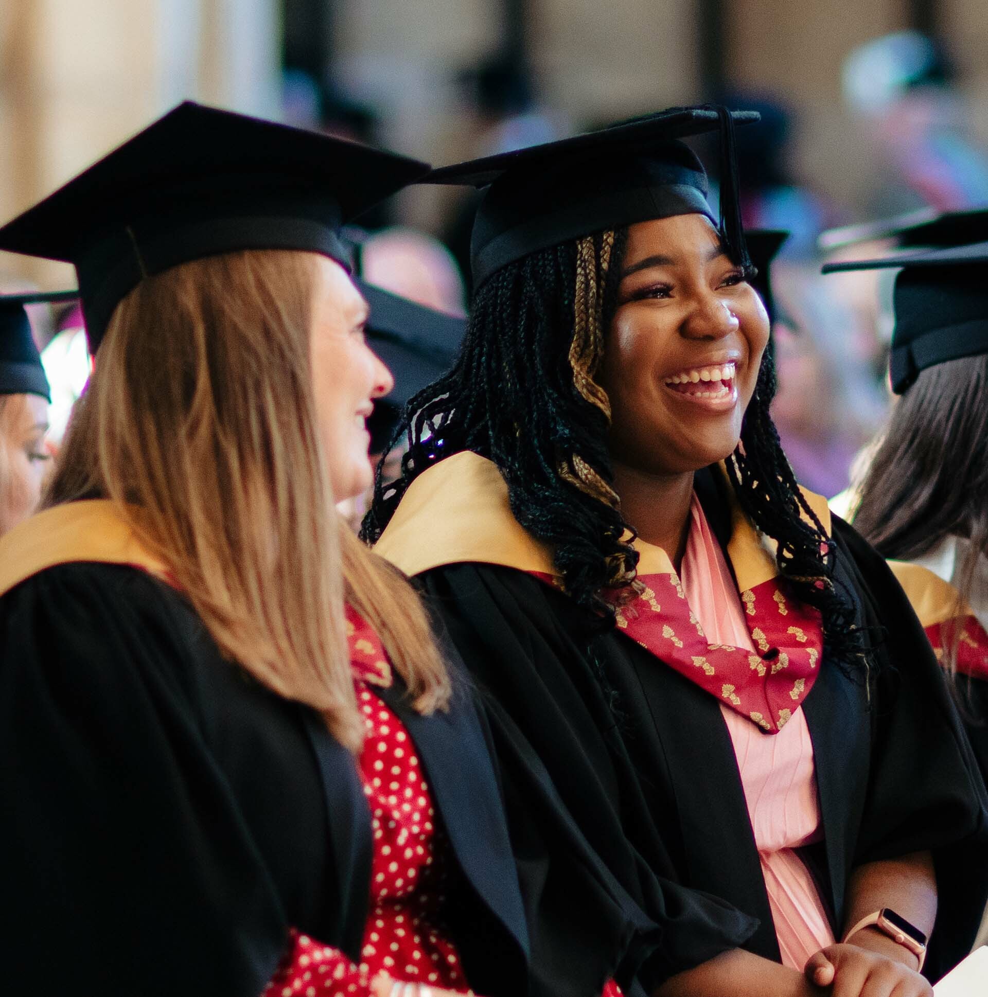 Riseholme College degree students laughing at graduation thumb